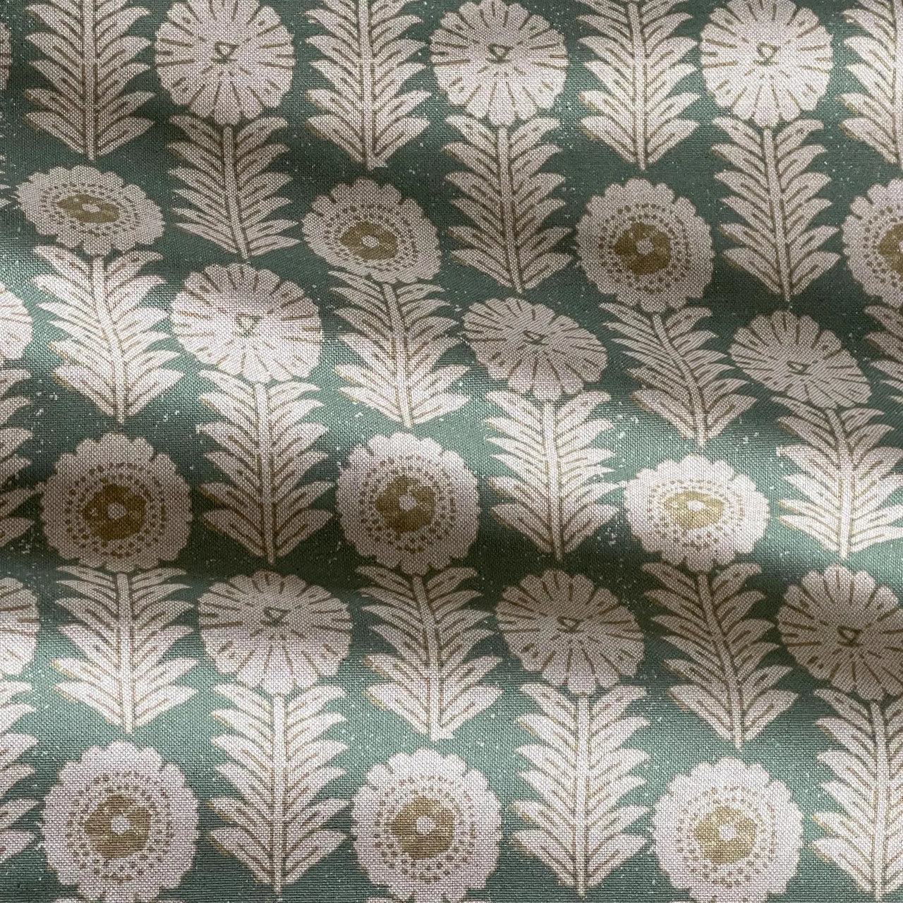 Nordic inspired green fabric with stylised flowers and foliage