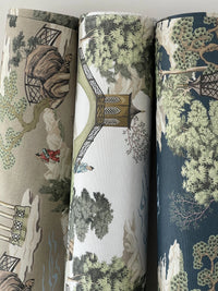Thumbnail for Three rolls of fabric with scenic patterns on a white background