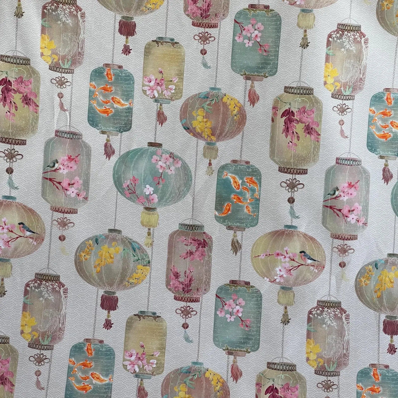Upholstery fabric with traditional lantern and bird design