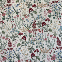 Thumbnail for Floral patterned fabric with red, blue, and green flowers on a white background