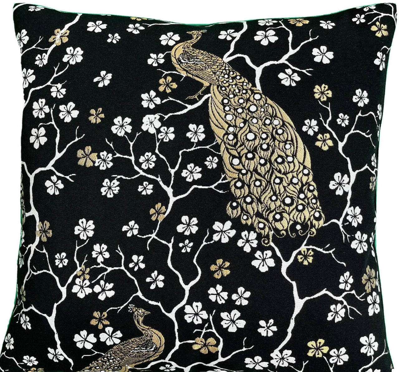 Decorative pillow with peacock and floral design on black background
