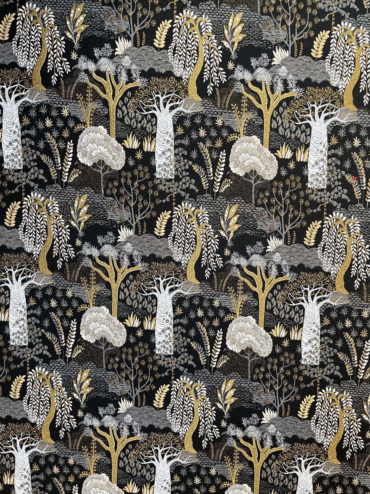 Designer Baobab black and gold fabric for drapery.