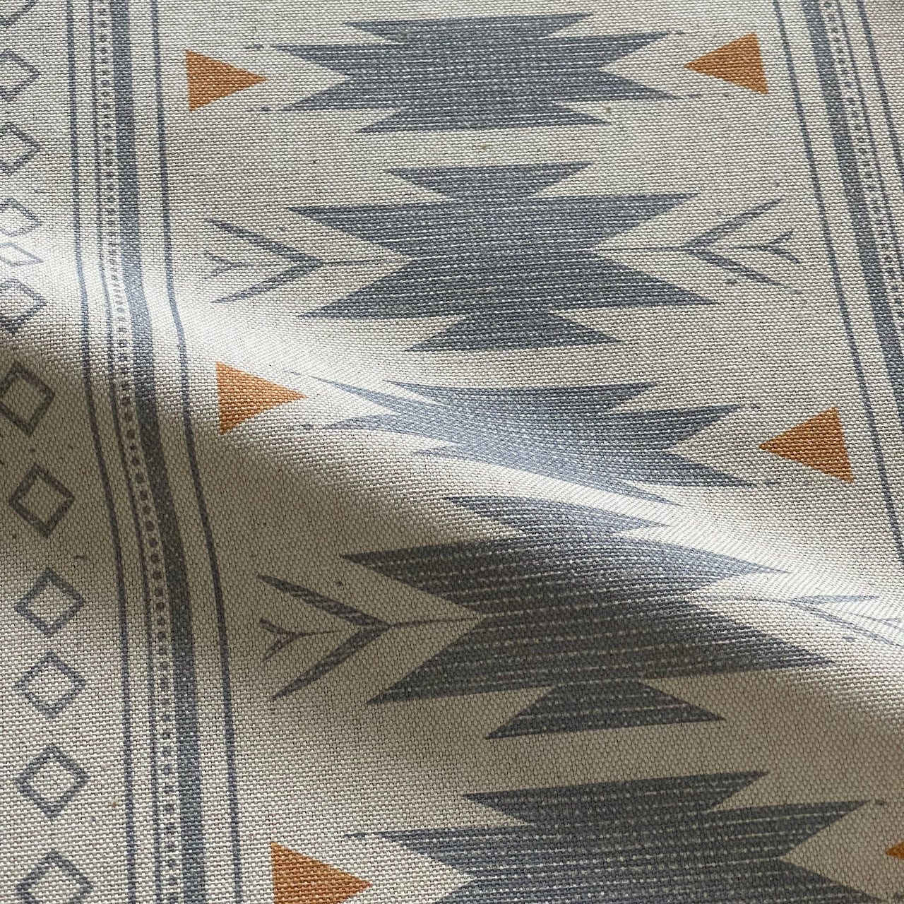 Aztec stripe fabric blue with diamond and arrow motifs