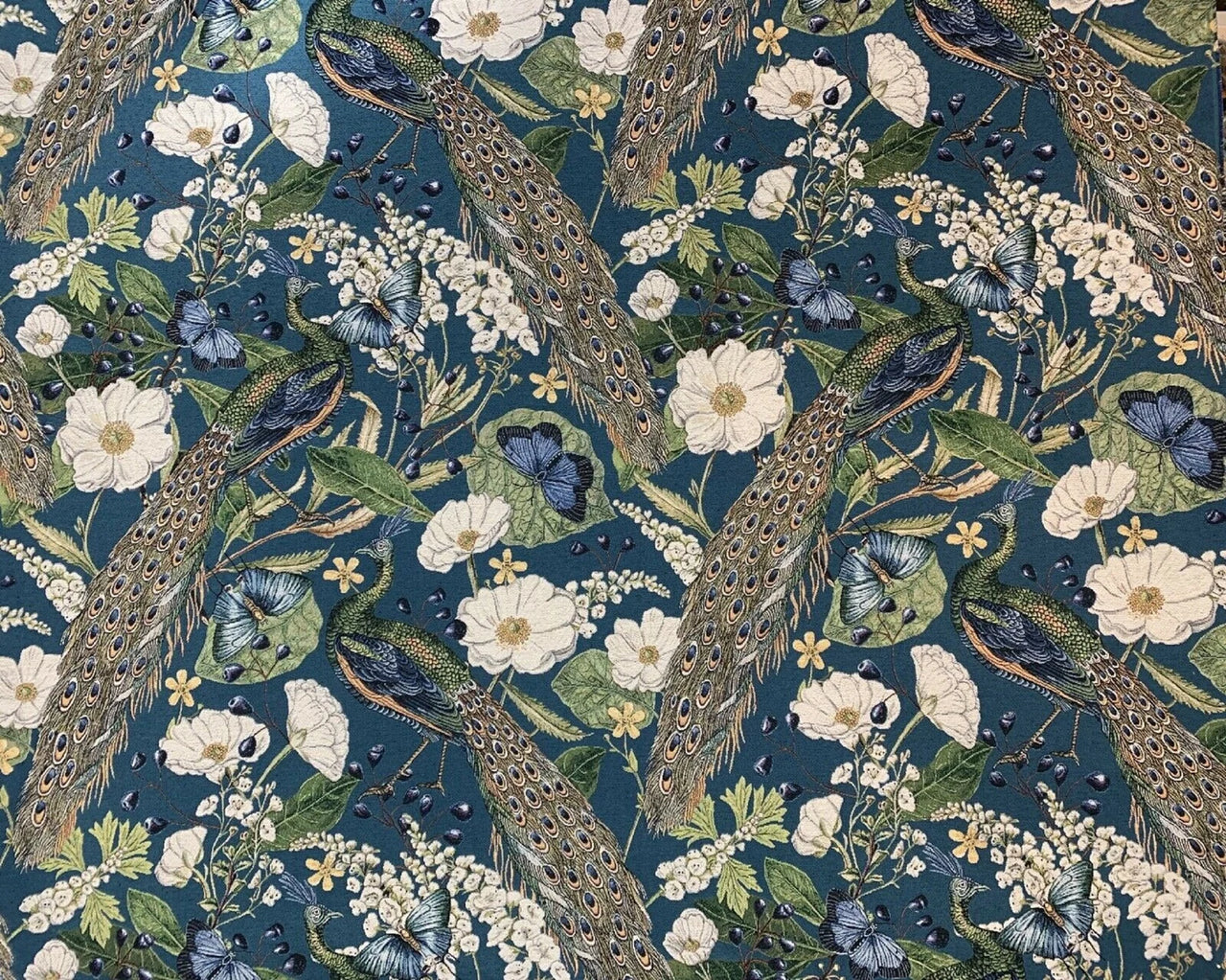 Pattern of peacocks and flowers on a dark blue background fabric