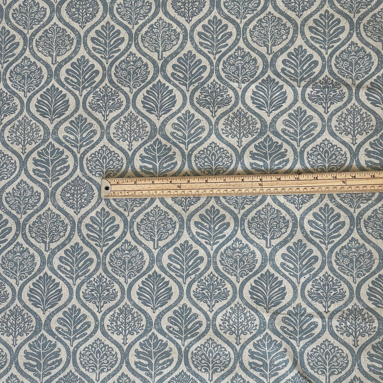 Soft neutral upholstery fabric with Nordic botanical motifs