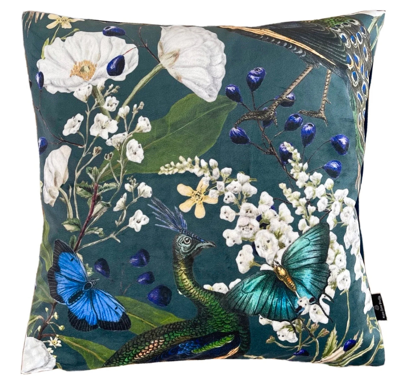 Square pillow with peacock and floral illustration.