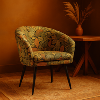 Thumbnail for Modern dining chair upholstered with tropical botanical fabric.

