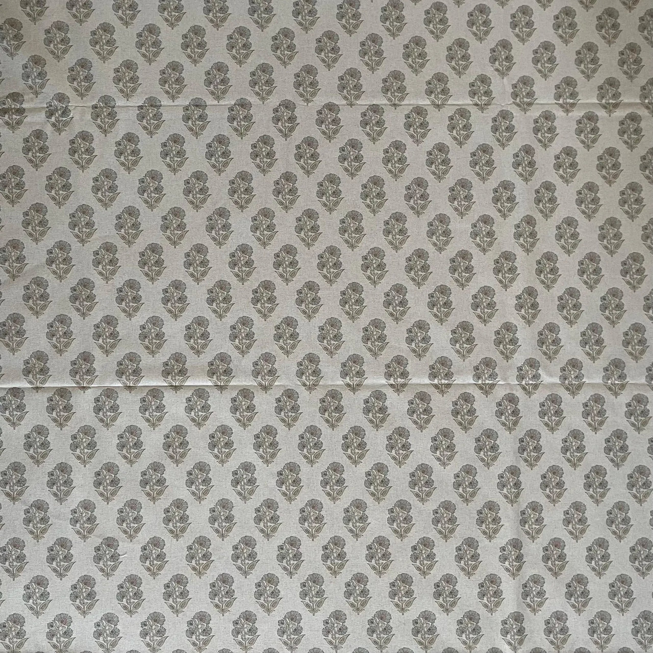 Neutral floral fabric with small botanical repeat and linen look