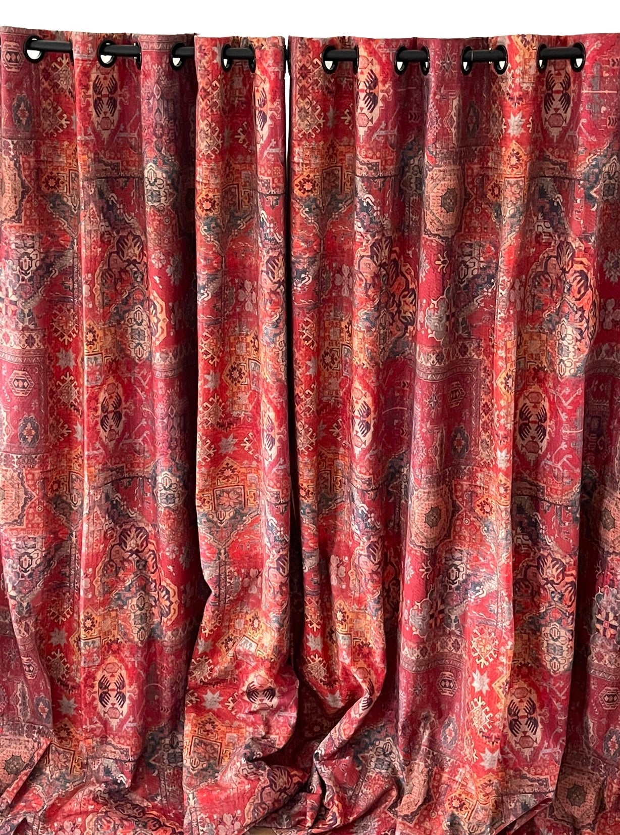 Traditional kilim-style cotton fabric in red hues.