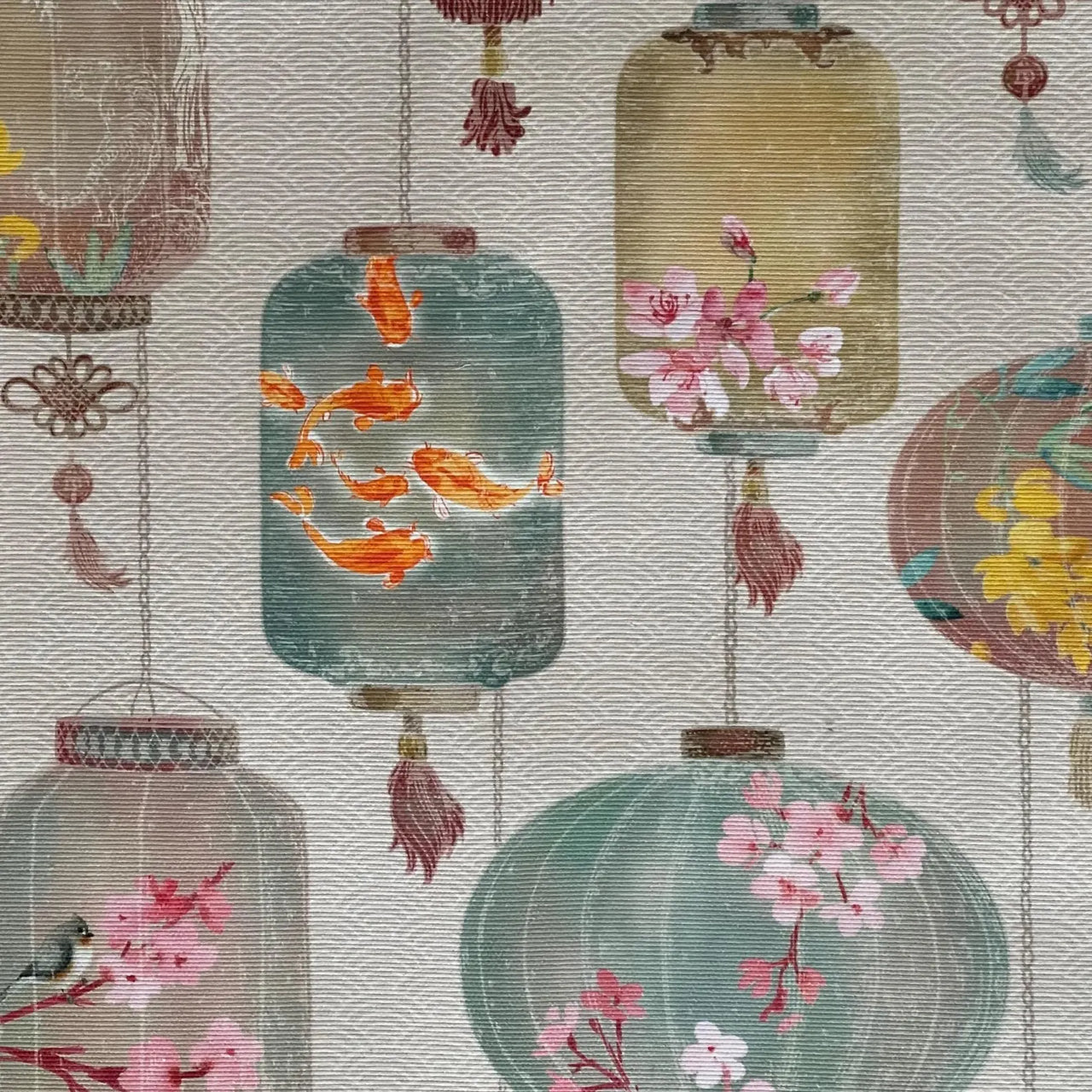 Oriental-style lantern print fabric in muted greens and pinks