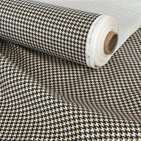 Thumbnail for Printed houndstooth fabric in neutral tones – organic cotton roll ideal for soft furnishings, accent chairs, and slow design interiors.

