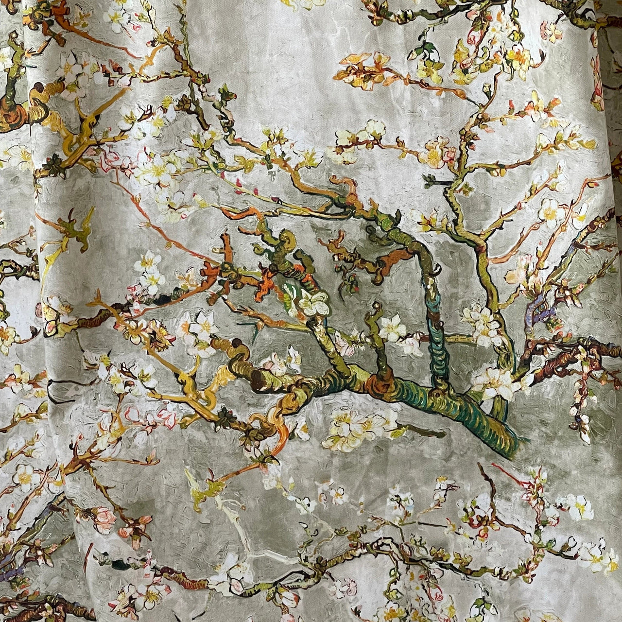 Nature-inspired printed fabric with delicate cherry blooms and artistic flair

