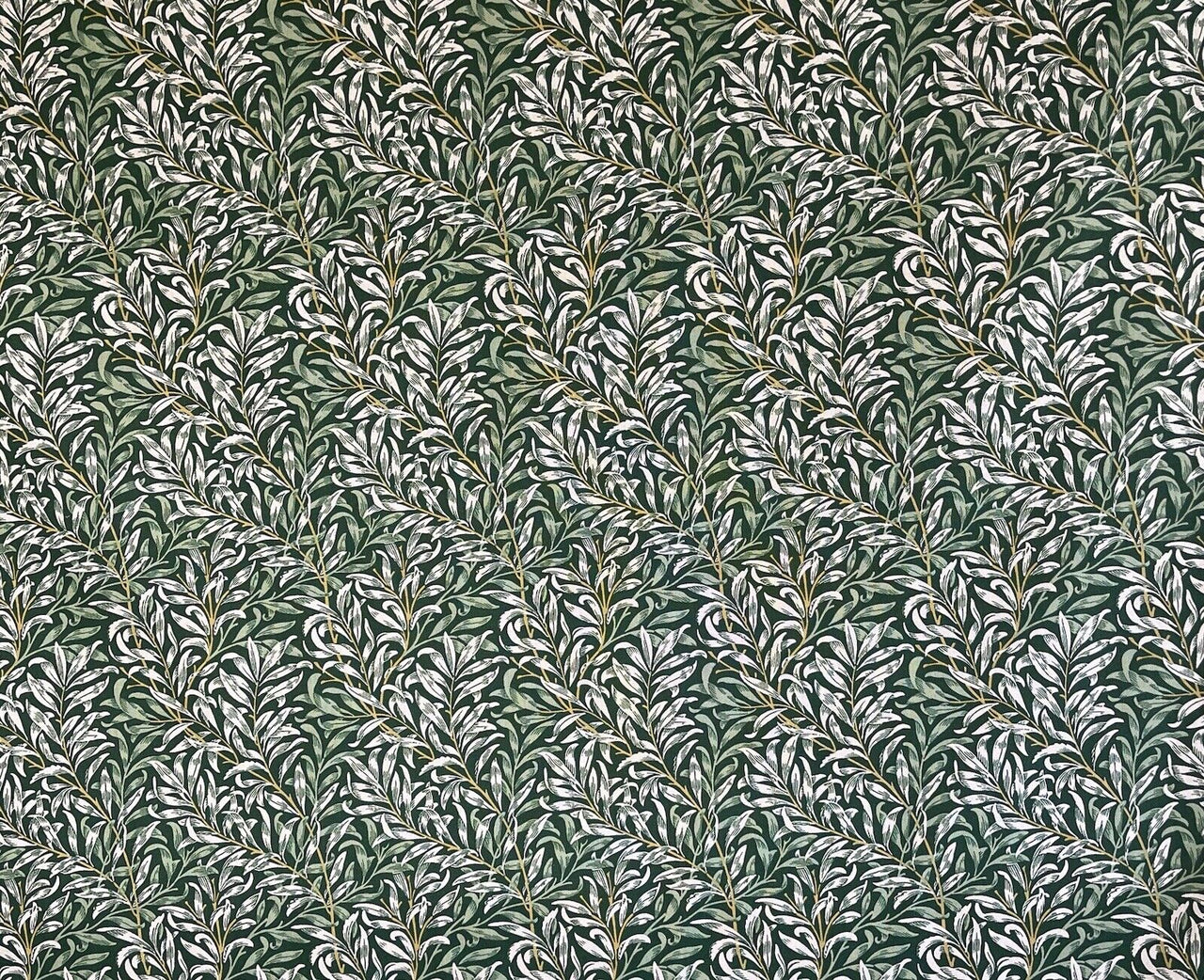 Detailed branches and leaves on Willow Boughs fabric.