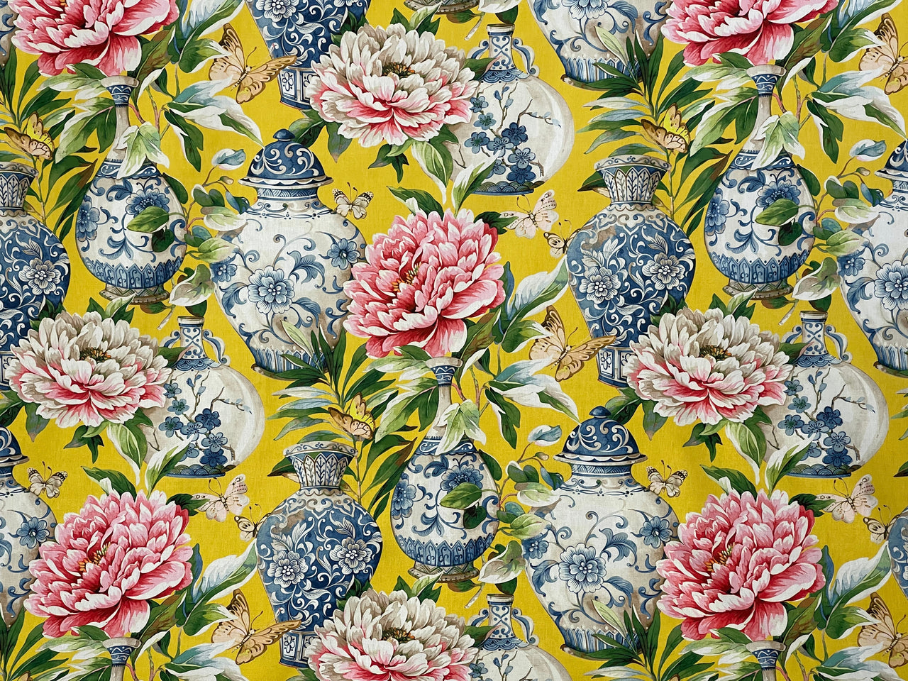 Chinoiserie-style fabric pattern with butterflies and large florals