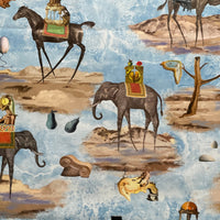 Thumbnail for Close-up of Salvador Dalí-inspired elephant imagery on blue cotton fabric with elongated legs and dreamlike landscape details.
