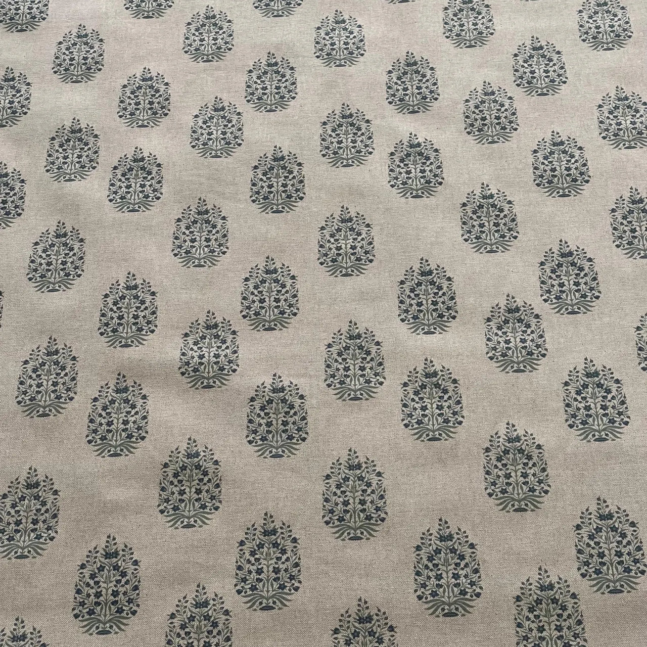 Blue and green floral medallion fabric with linen texture finish