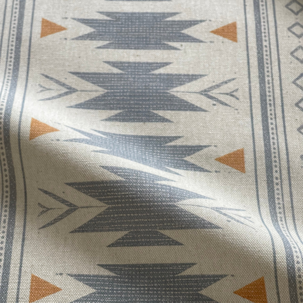 Blue geometric fabric with Aztec stripe design for home decor