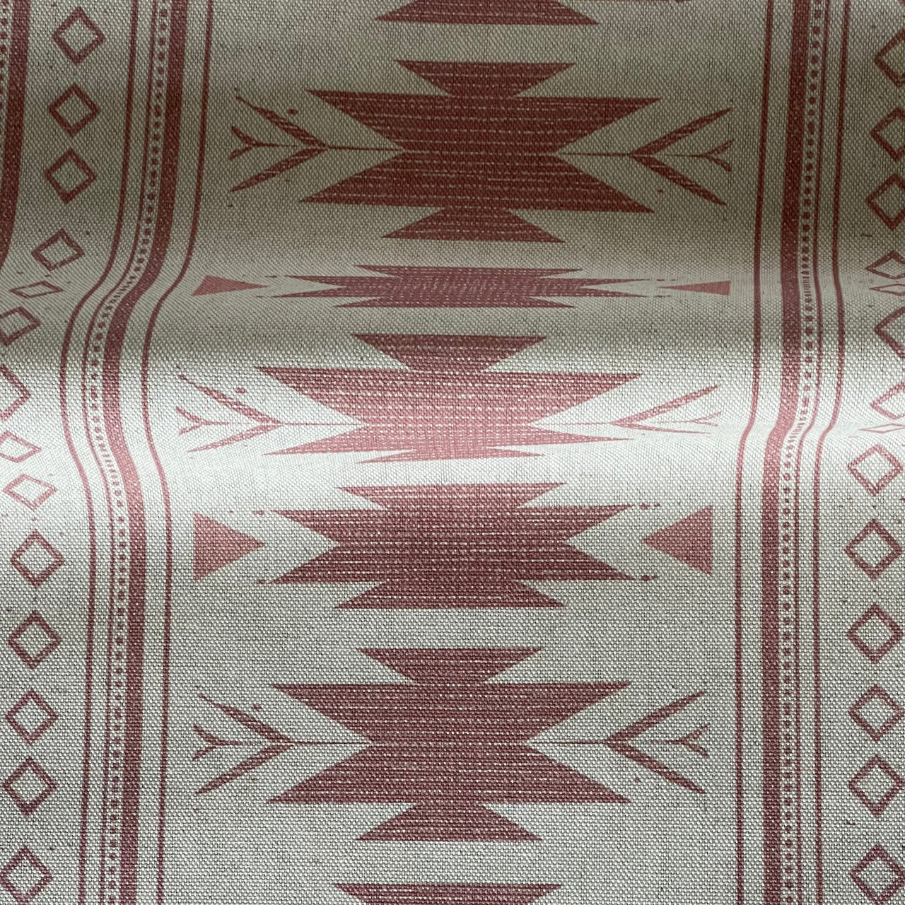 Blush pink geometric fabric with Aztec stripe design for home decor