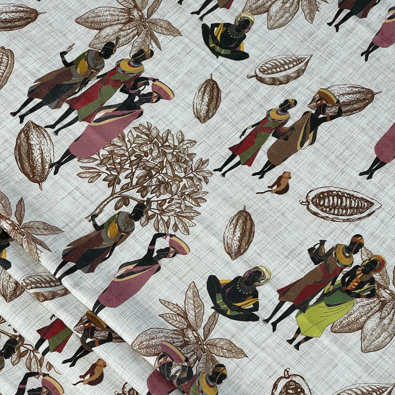Tribal fabric with African women and botanical illustrations.