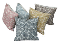 Thumbnail for Coordinated decorative cushions in ochre, pink, blue and taupe with linen look botanical fabric design