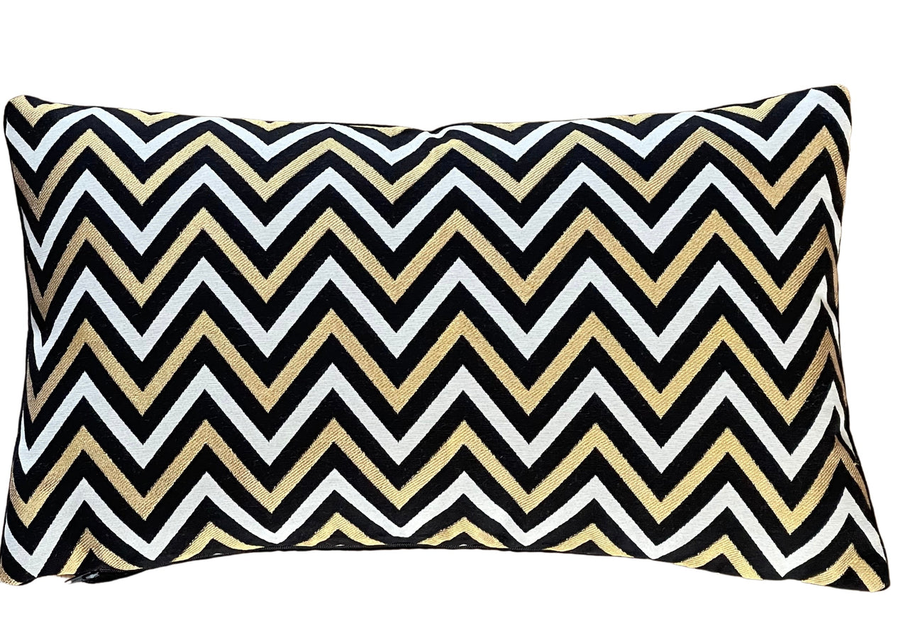Metallic gold chevron cushion with black and white base.