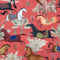 Thumbnail for Patterned fabric with horses and palm trees on a red background