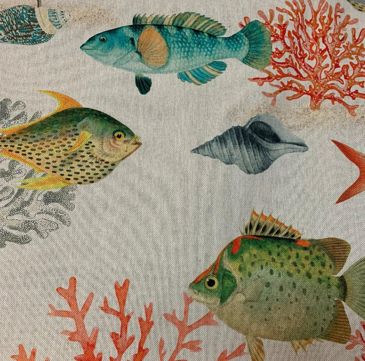 Fabric showcasing colorful fish and corals