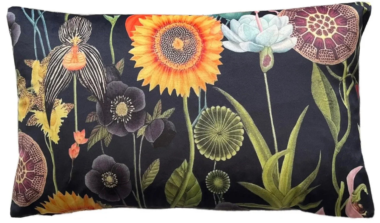 Rectangular velvet pillow cover with tropical floral design including sunflowers, lotus pods, white lotus, and poppy seed pods on a dark base.

