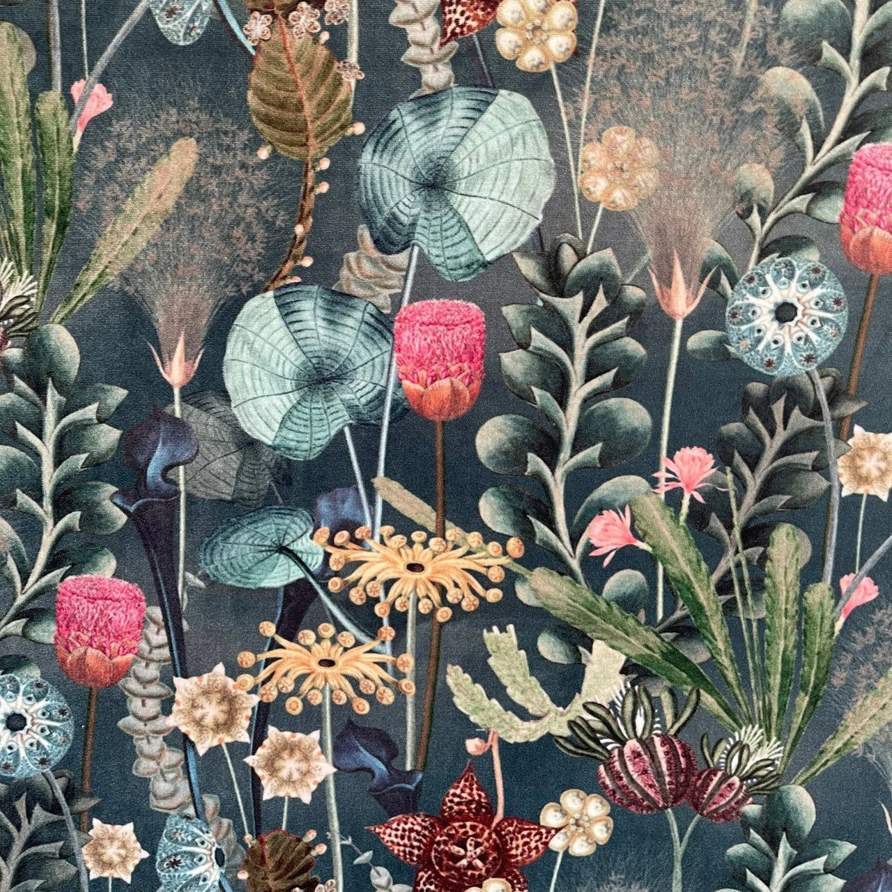 Colorful floral and leaf pattern on a dark background