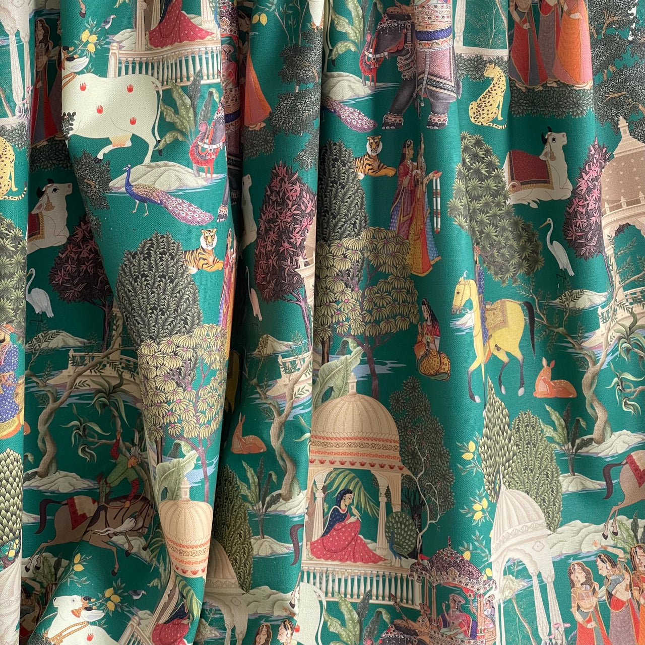 Peacock, tiger, and Maharajah design on premium cotton with tropical detailing.