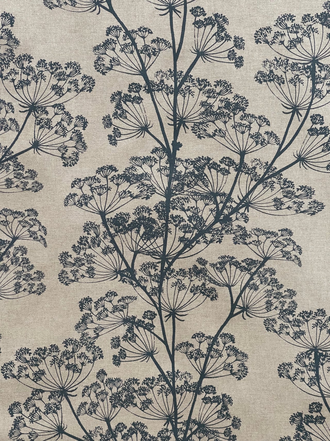 Indigo floral fabric with detailed cow parsley stems and natural texture