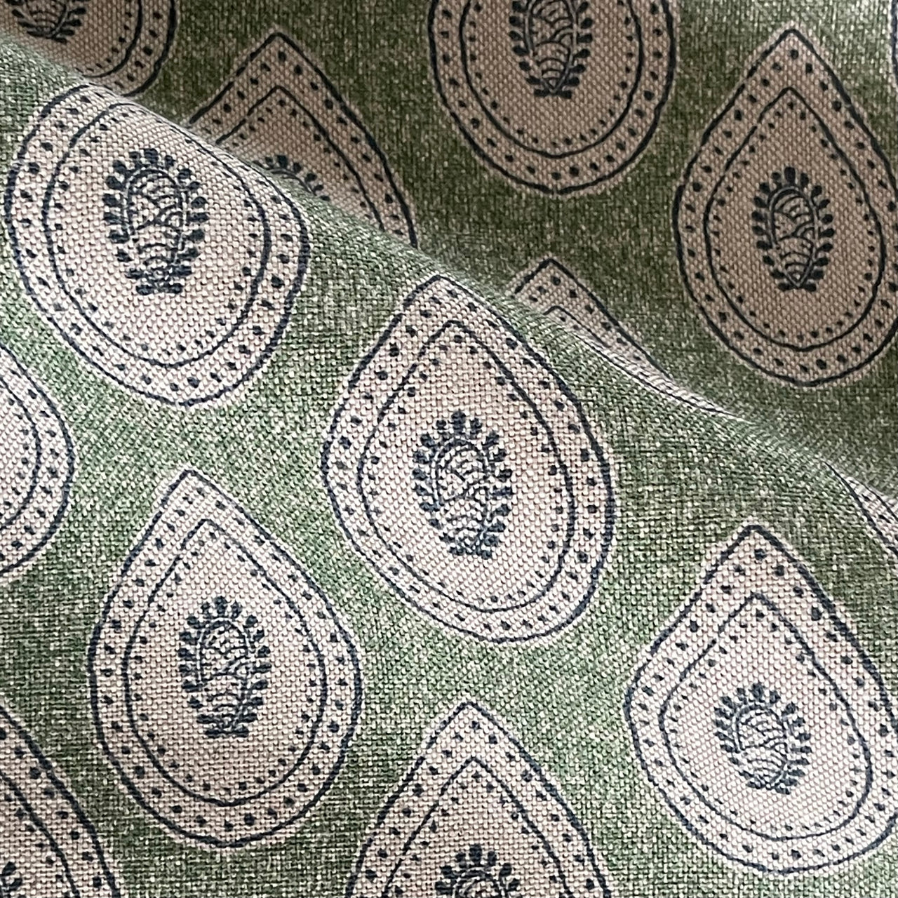 Sage green linen look fabric with repeating teardrop paisley pattern