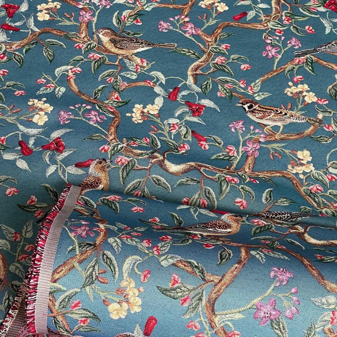 Richly woven tapestry fabric showcasing perched songbirds