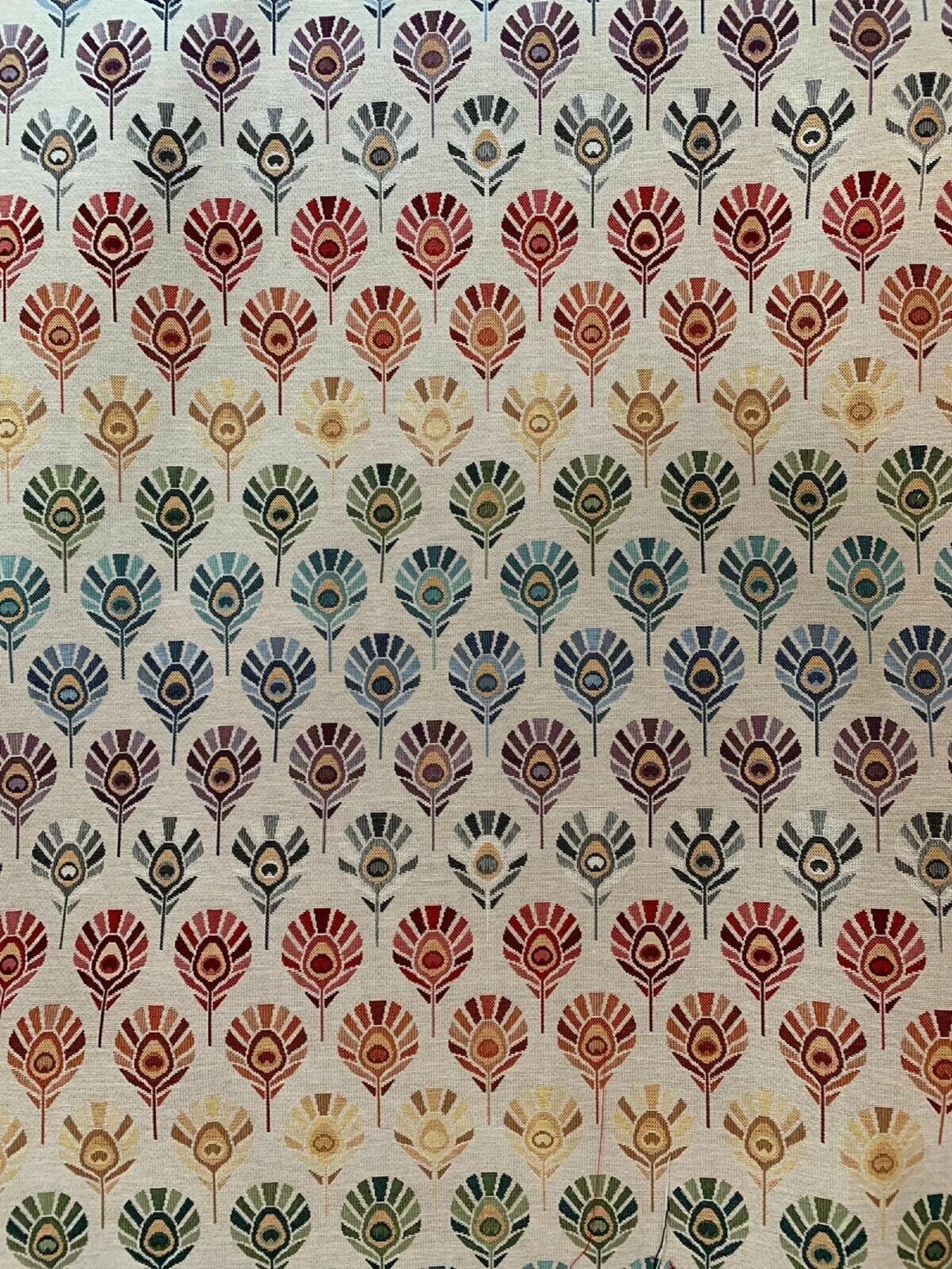 Peacock-inspired fabric pattern in vibrant colors