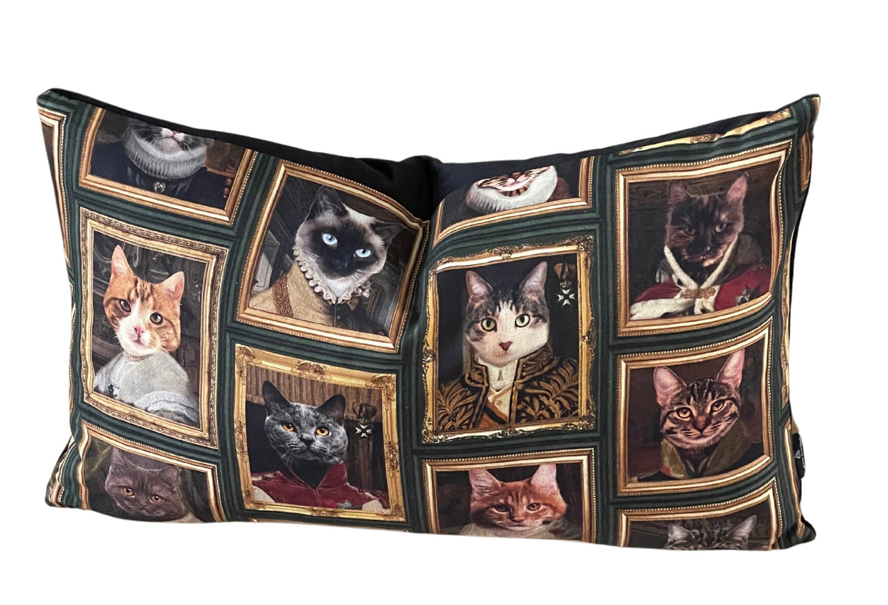 Noble cat artwork in gold frames on decor pillow