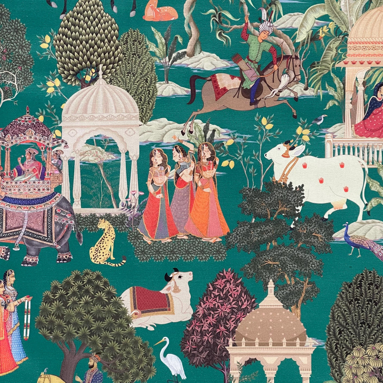 Upholstery fabric in green with detailed Indian motifs—great for boho, eclectic, and maximalist interiors.


