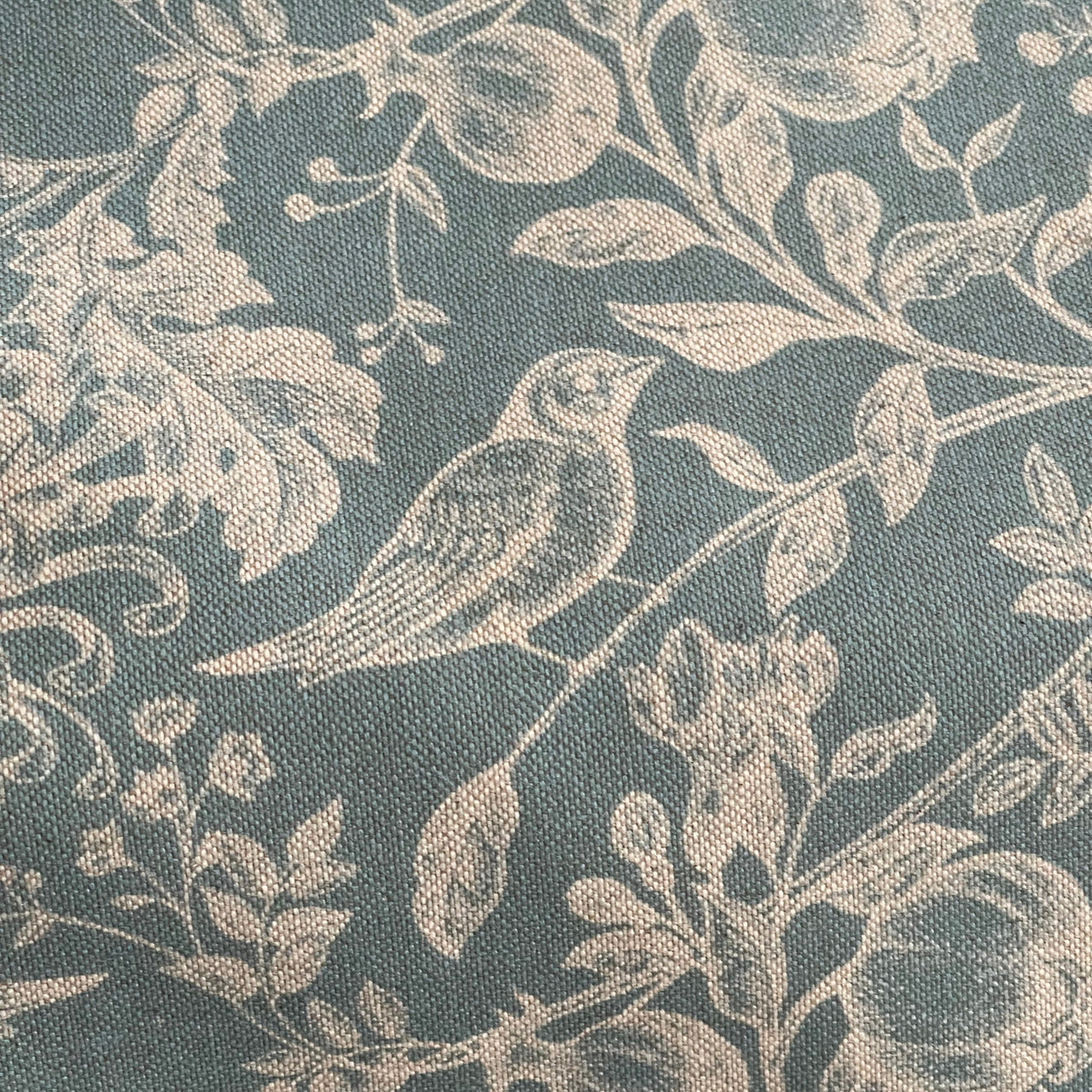 Fabric swatch of robin and flowers design