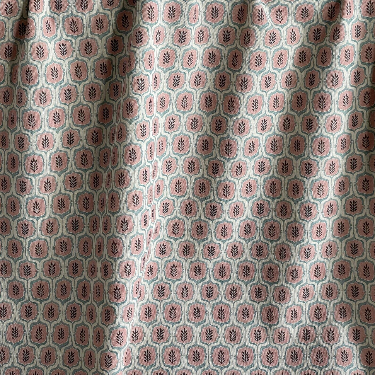 Blush pink vintage leaf pattern upholstery material.