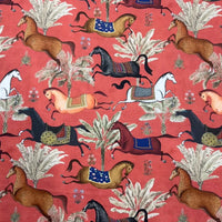 Thumbnail for Patterned fabric with horses and plants on a red background