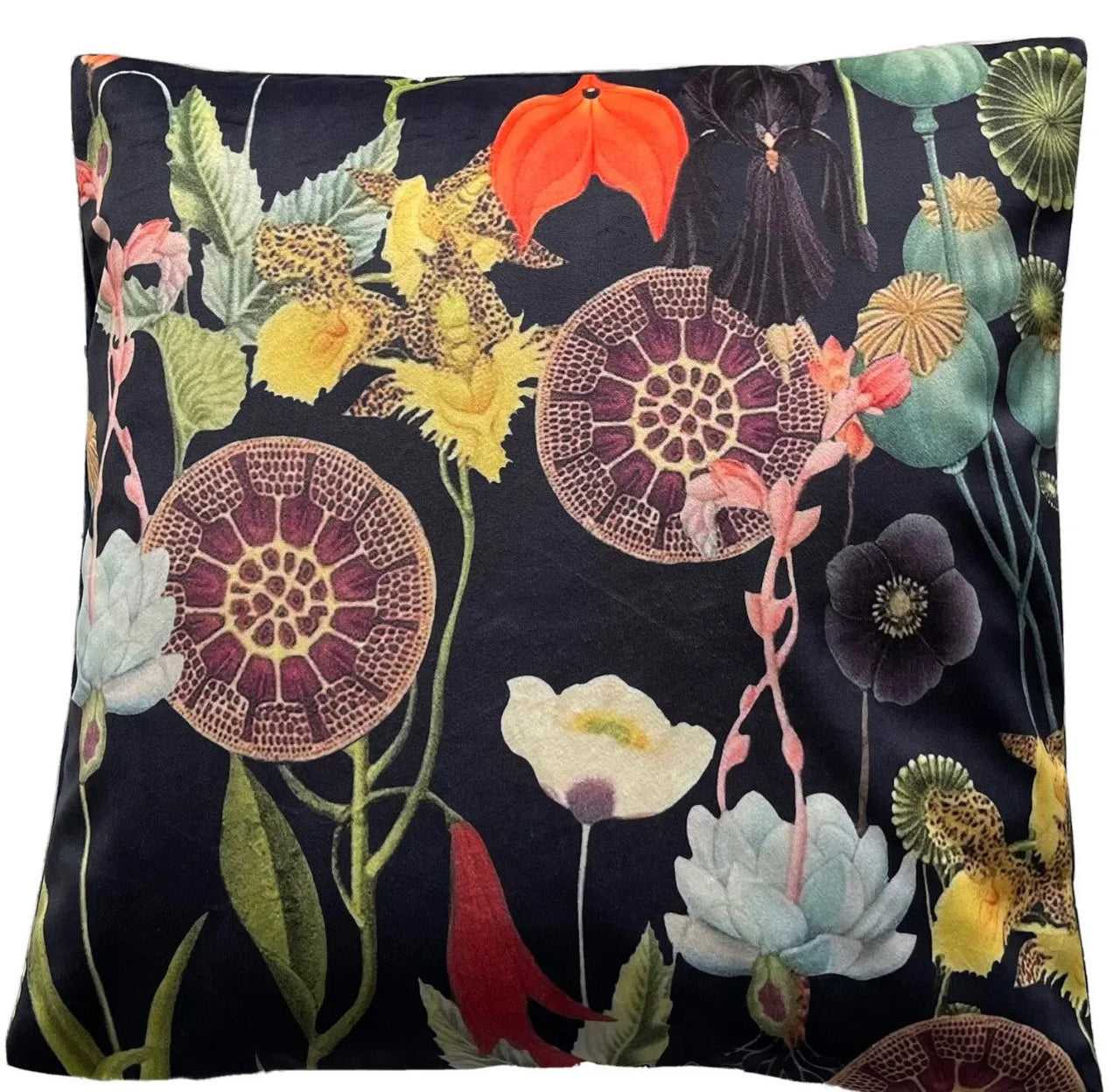 Velvet cushion cover featuring exotic botanical print with yellow orchids, lotus pods, red flowers, and white poppies on a black background.

