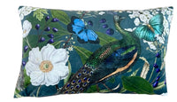 Thumbnail for Decorative pillow with peacock, butterfly, and floral design on a blue background