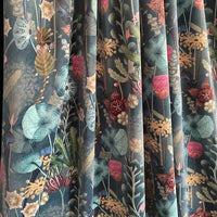 Thumbnail for Close-up of floral patterned fabric with a dark background