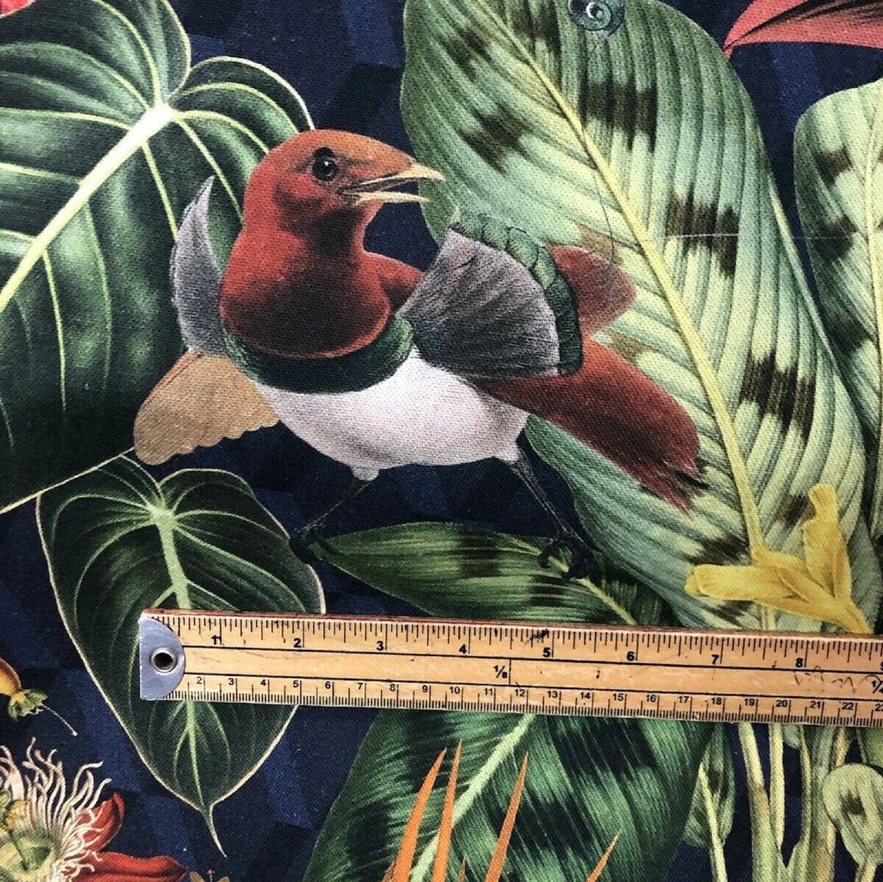 Rich botanical fabric in orange and green tones