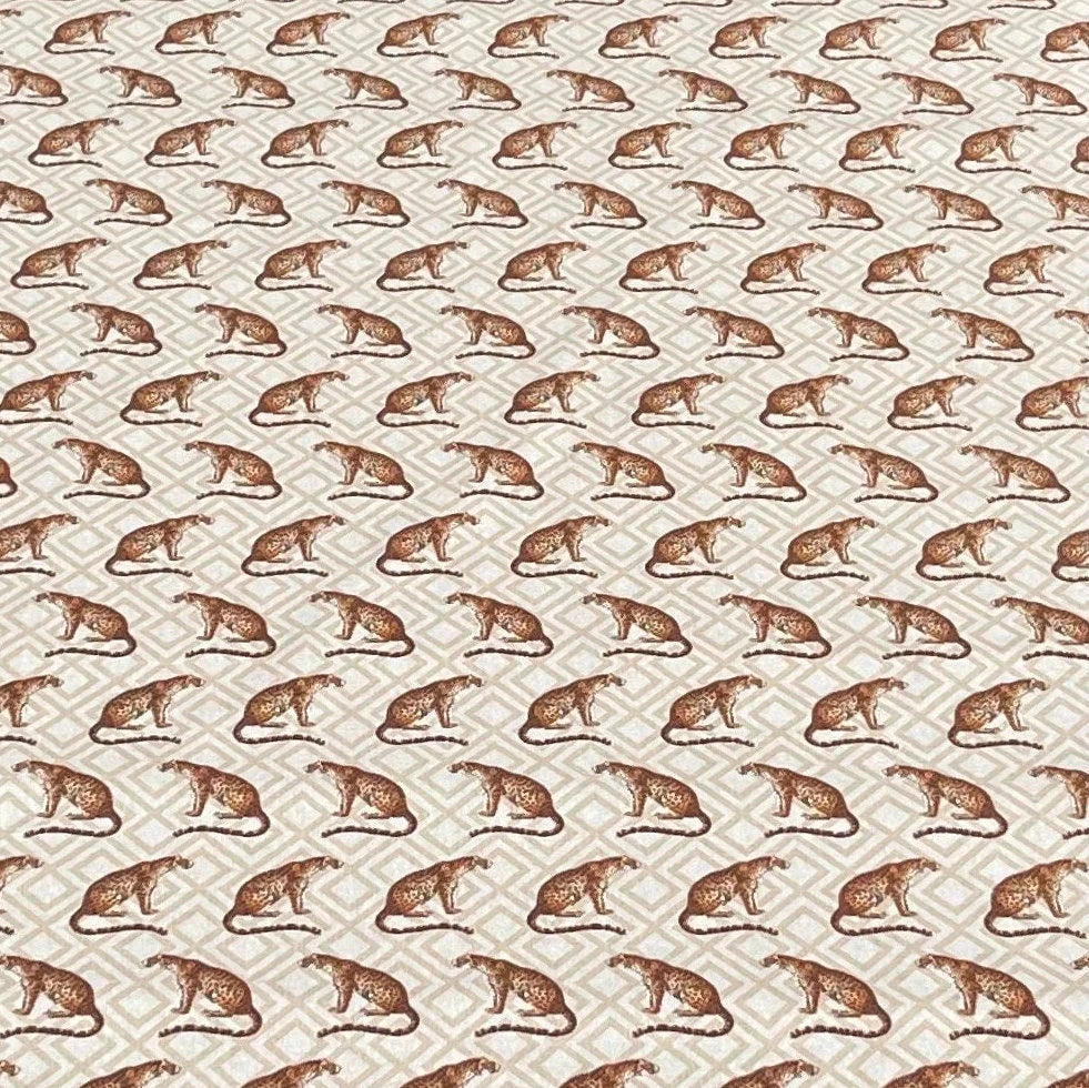Pattern of leopards on a beige background