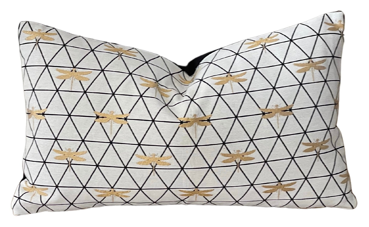 Handcrafted Nordic cushion with dragonfly pattern.