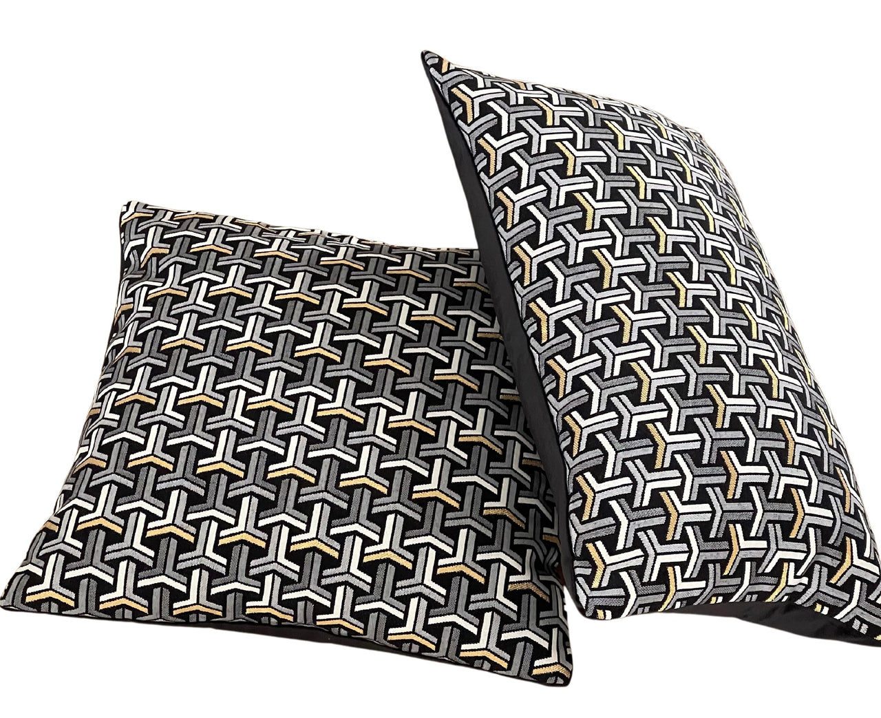 Decorative cushion with contemporary chevron design.