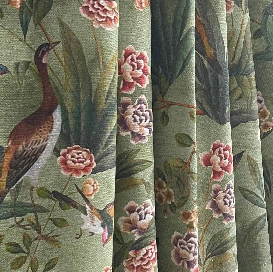 Vintage-style curtain made from green botanical cotton fabric with goose and floral print