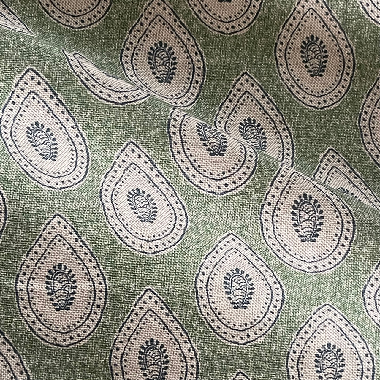 Green patterned fabric with small scale paisley repeat design