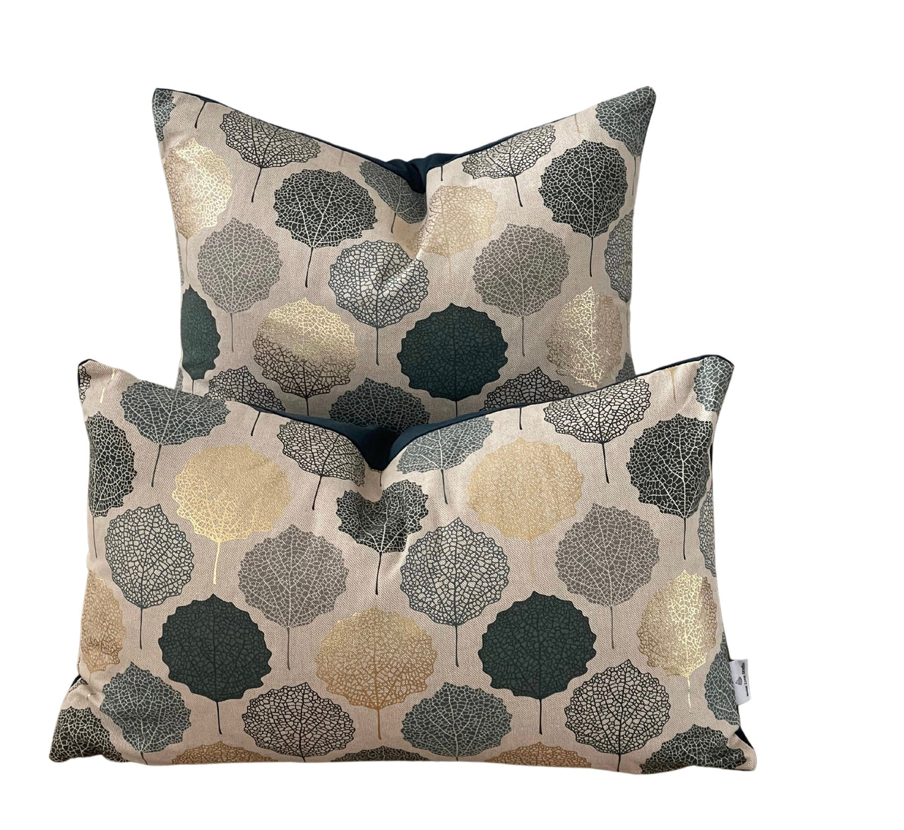 Botanical print cushion cover with metallic highlights.