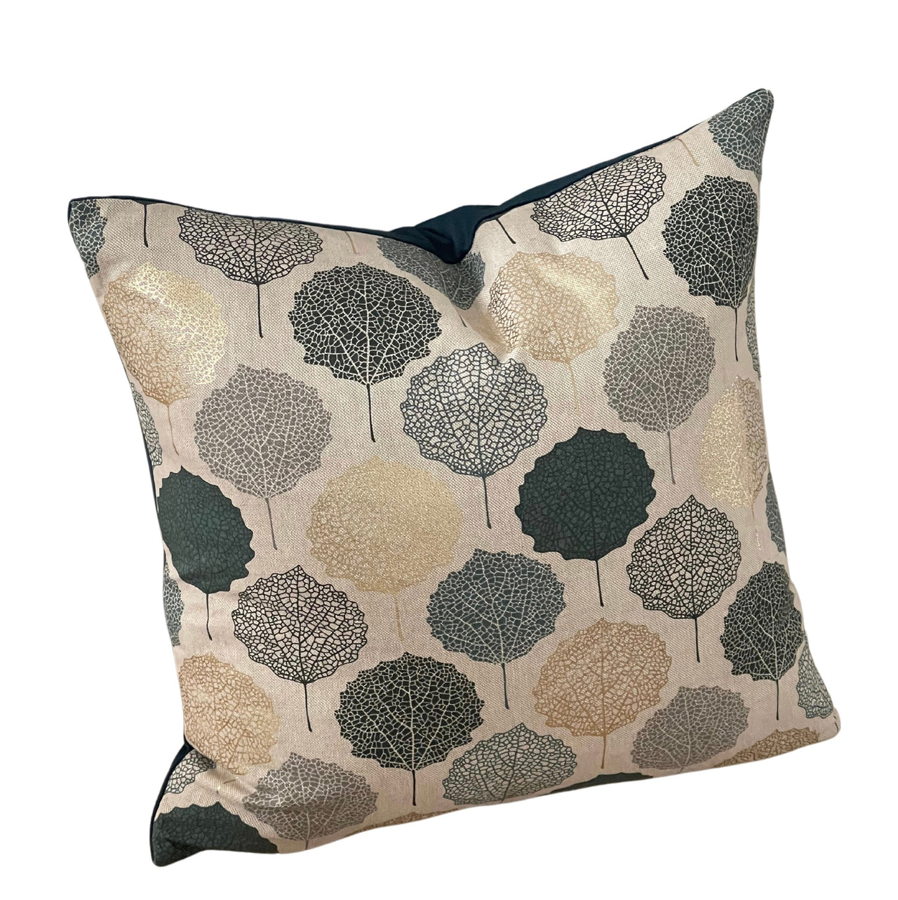 Geometric cushion with botanical leaf patterns.

